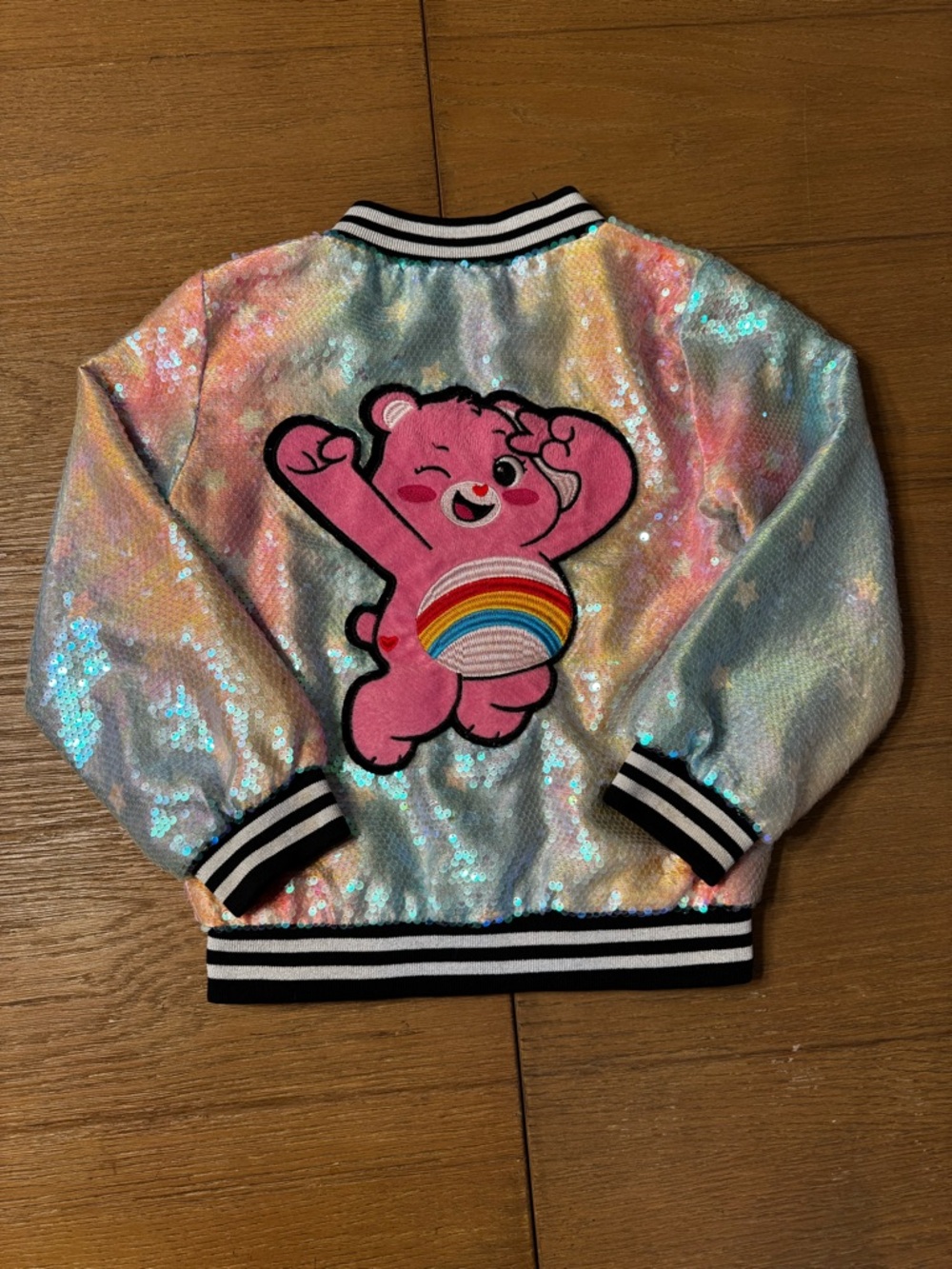 Lola + The Boys Iridescent Rainbow Sequin Bomber Jacket- Care Bear